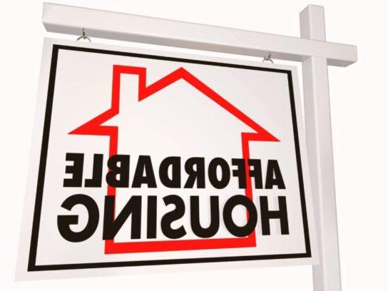 photo of realtor type sign with words affordable housing